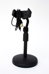 A black monopod smartphone stand holder, isolated on white background.