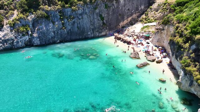 Aerial drone cinematic video of famous for sulphur and small coves and caves beach of Xigia in northern part of Zakinthos island, Ionian Sea, Greece