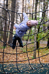 Kid in autumn park