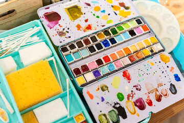 Watercolor painting palette and art workshop supplies