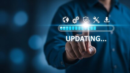 A person interacts with a digital screen showing an updating progress bar and icons