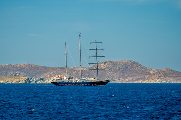 Classic sailing yacht with tall masts in the Aegean Sea near Greek islands © Juan