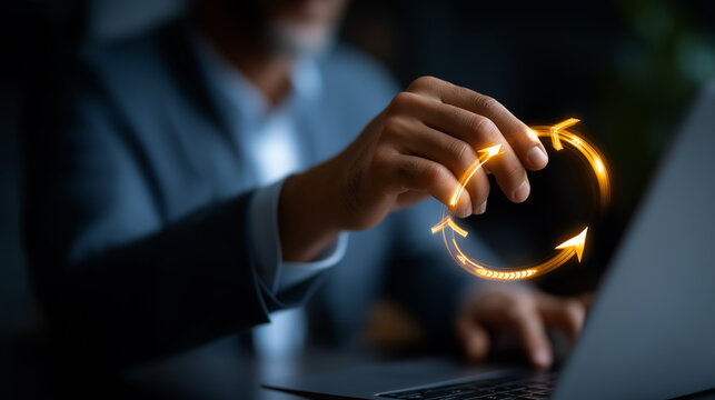 Feedback loop for continuous improvement visualization defocused business background decision making strategy concept OODA and PDCA cycles faceless man using laptop managing
