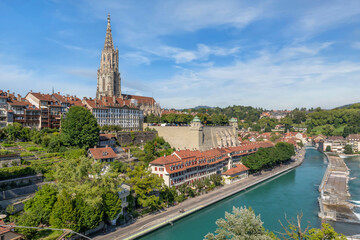 Bern, Switzerland. Cityscape with Aare river and bell tower of Cathedral