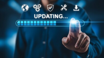 Obraz premium Finger touching a screen to begin a system update and software maintenance procedure