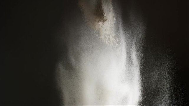 Particles Fall: Controlled visual movement emphasizing flow and continuity