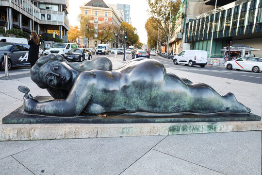 Woman with Mirror. Bronze sculpture by Fernando Botero in Madrid city
