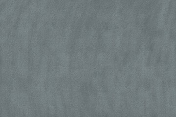 Texture of a blue surface with soft patterns and smooth appearance in a simple setting