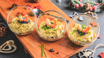 Verrine avocado shrimp pink fresh cheese guacamole chives cream lumpfish roe - decorated for Christmas