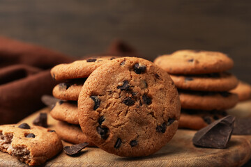 Delicious chocolate chip cookies on table, closeup