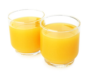 Fresh orange juice in glasses isolated on white
