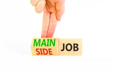 Main or side job symbol. Concept words Main job or Side job on beautiful wooden cubes. Beautiful white background. Businessman's hand. Business main or side job concept. Copy space