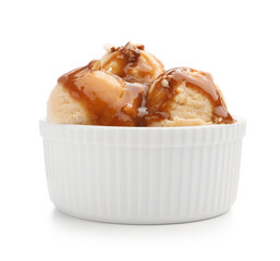 Tasty ice cream with caramel sauce and almonds in bowl isolated on white