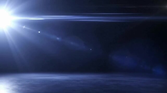 Dramatic dark stage background featuring intense blue lens flare light beams illuminating a smoky empty floor for cinematic presentation or product reveal