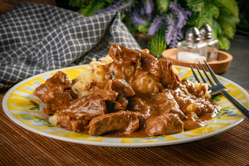 Chunky beef stew with savory sauce.