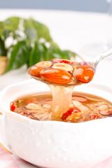 Healthy Soup with Dates, Raisins and Nuts in Silver Dish