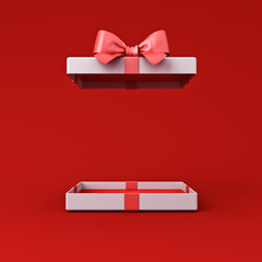 Blank low white present box open with red inside product display mock up showcase or blank red gift box with red ribbon bow isolated on red background with shadow creative idea concepts 3D rendering