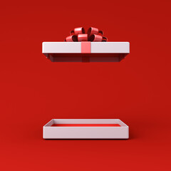 Obraz premium Blank low white present box open with red inside product display mock up showcase or blank red gift box with red ribbon bow isolated on red background with shadow creative idea concepts 3D rendering