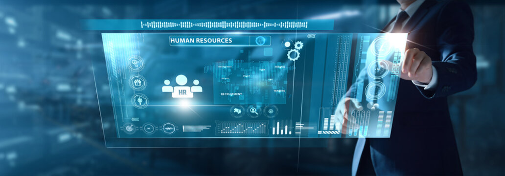 Businessman analyzing HR data on virtual interface employee metrics, recruitment trends, performance insights, workforce planning, talent management.