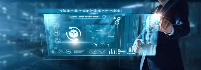 Businessman analyzing SCM data on virtual interface supply chain flow, inventory accuracy, logistics performance, vendor coordination, delivery metrics.