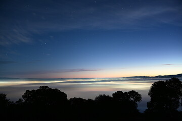 Beautiful dawn sunrise over Pleasanton, California with moon and stars