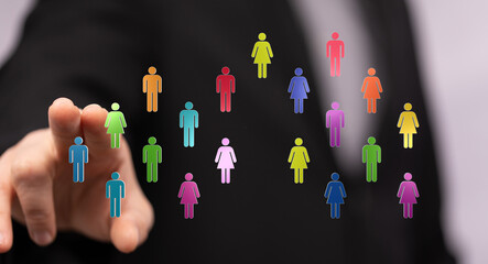 Hand pointing at colorful digital people icons. Representation of global community, social connection, and teamwork. Perfect for business and te