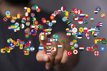 Diverse hand pointing at flags representing countries. Global community, unity, international relations, and cultural exchange concept. Represen