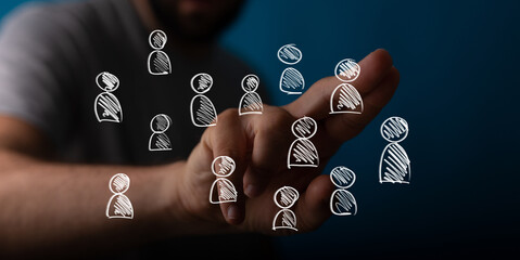 Human hand touching a vibrant virtual network of stylized user icons, symbolizing global connection, digital community, social media, and busine