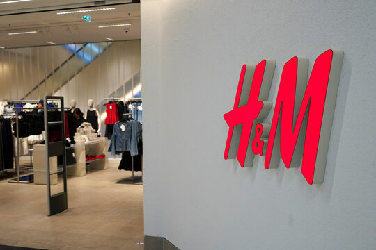 Tbilisi, Georgia - December 14, 2025 H&M Logo Company on a White Store Wall
