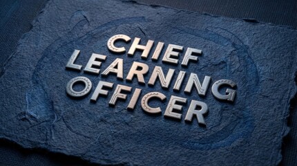 Chief Learning Officer Title Sign on Slate Background