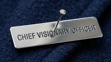 Close-Up of Chief Visionary Officer Nameplate on Fabric