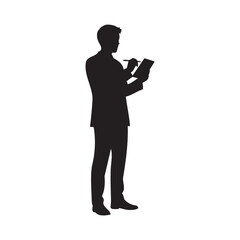 Silhouette of man reading a book in darkness