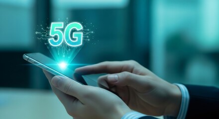 Man holding smartphone with glowing 5G icon. High-speed internet connection and mobile network technology for communication and digital future.