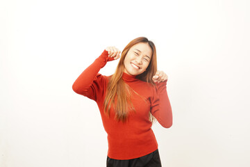 Cheerful young woman making 'cat ears' gesture with her hands, expressing playfulness, fun, or a cute, silly mood.