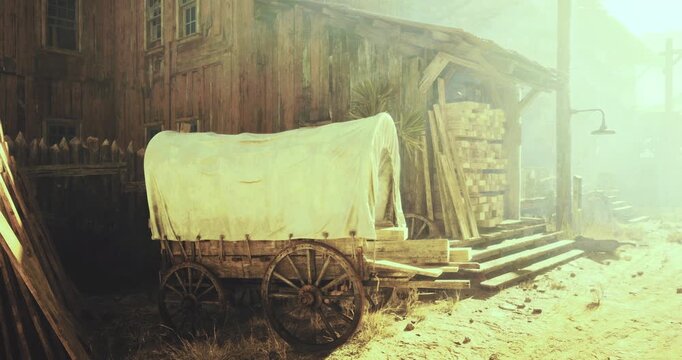 A weathered wooden wagon stands beside a rustic building with stacked planks, bathed in warm sunlight. The quiet scene evokes a sense of the old west with its historic charm.