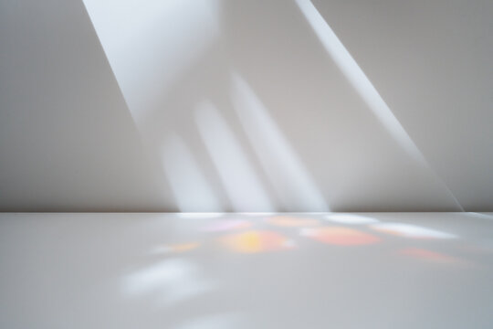 Stained glass lights on wall. Abstract background for product presentations.