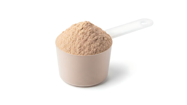 Protein powder supplement in a scoop