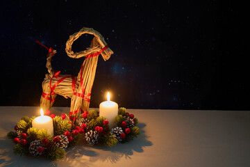 Fototapeta premium Julbock Christmas Straw Goat and Candles