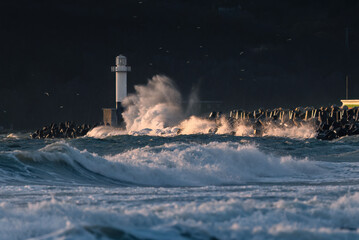 Lighthouse in sea at sunrise in Varna, Bulgaria