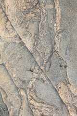Weathered Stone Surface with Natural Cracks and Rough Texture