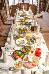 Festive banquet table with traditional dishes