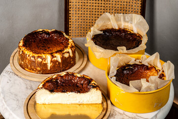 Basque burnt cheesecake collection on marble table