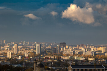 Naklejka premium Beautiful cumulus clouds over Obolon district skyline