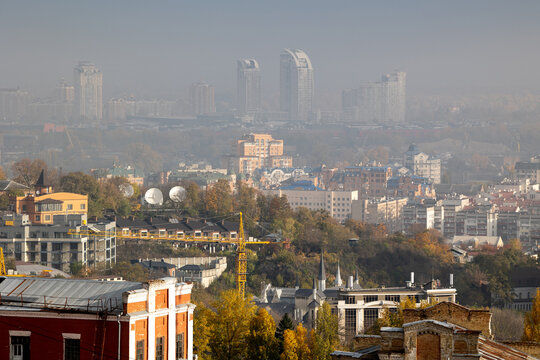 Telephoto cityscape view of Obolon district skyscrapers seen from Podil hills