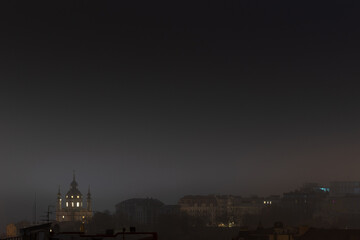 Dark atmospheric night skyline with St Andrew's Church