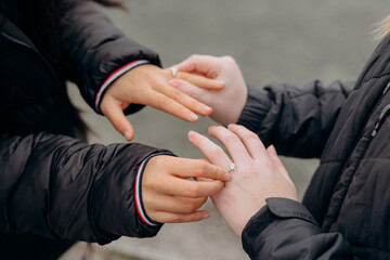 Romantic proposal for a same-sex couple filled with emotion, Wedding proposal for a same-sex couple focused on love and commitment