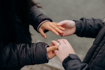 Romantic proposal for a same-sex couple filled with emotion, Wedding proposal for a same-sex couple focused on love and commitment