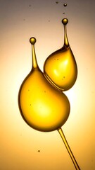 Two golden liquid drops forming an abstract double gourd shape with delicate stems and tiny spheres.