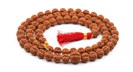 Obraz premium Rudraksha mala with red tassel on white background showcasing spiritual significance. Rudraksha mala features unique beads made from sacred seeds, often used in meditation and yoga practices.