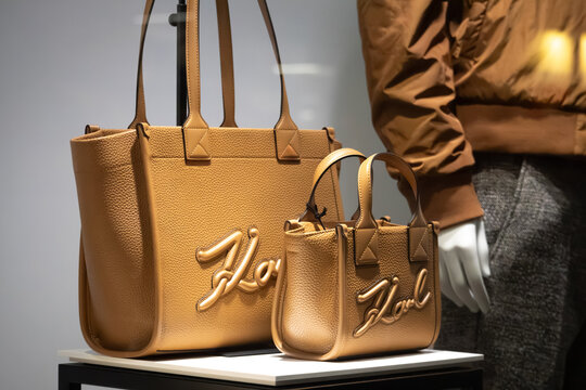 Nice, France - November 14, 2025: Karl Lagerfeld handbags displayed in a boutique window in Nice